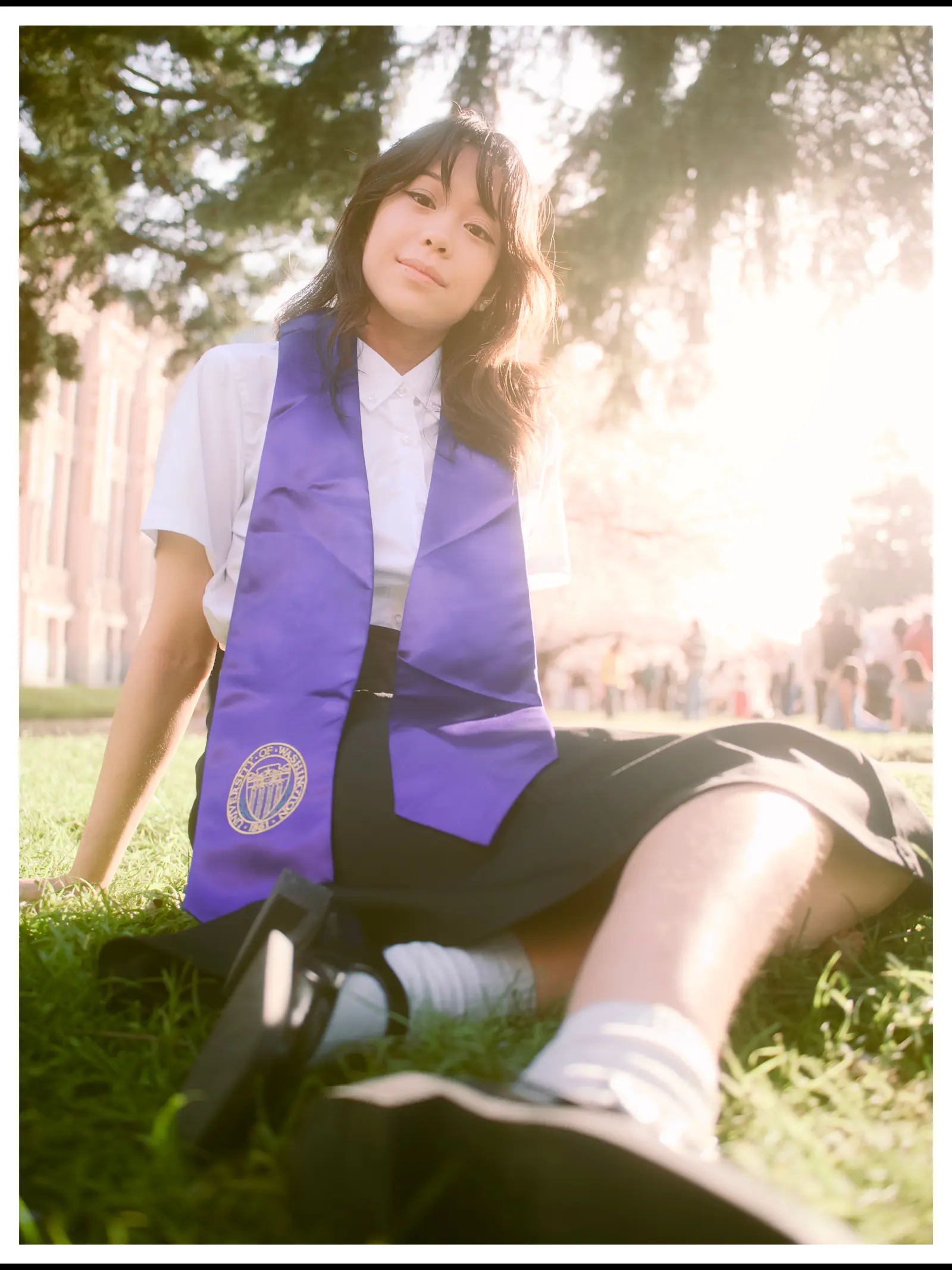 UW senior portrait spinning at the Quad